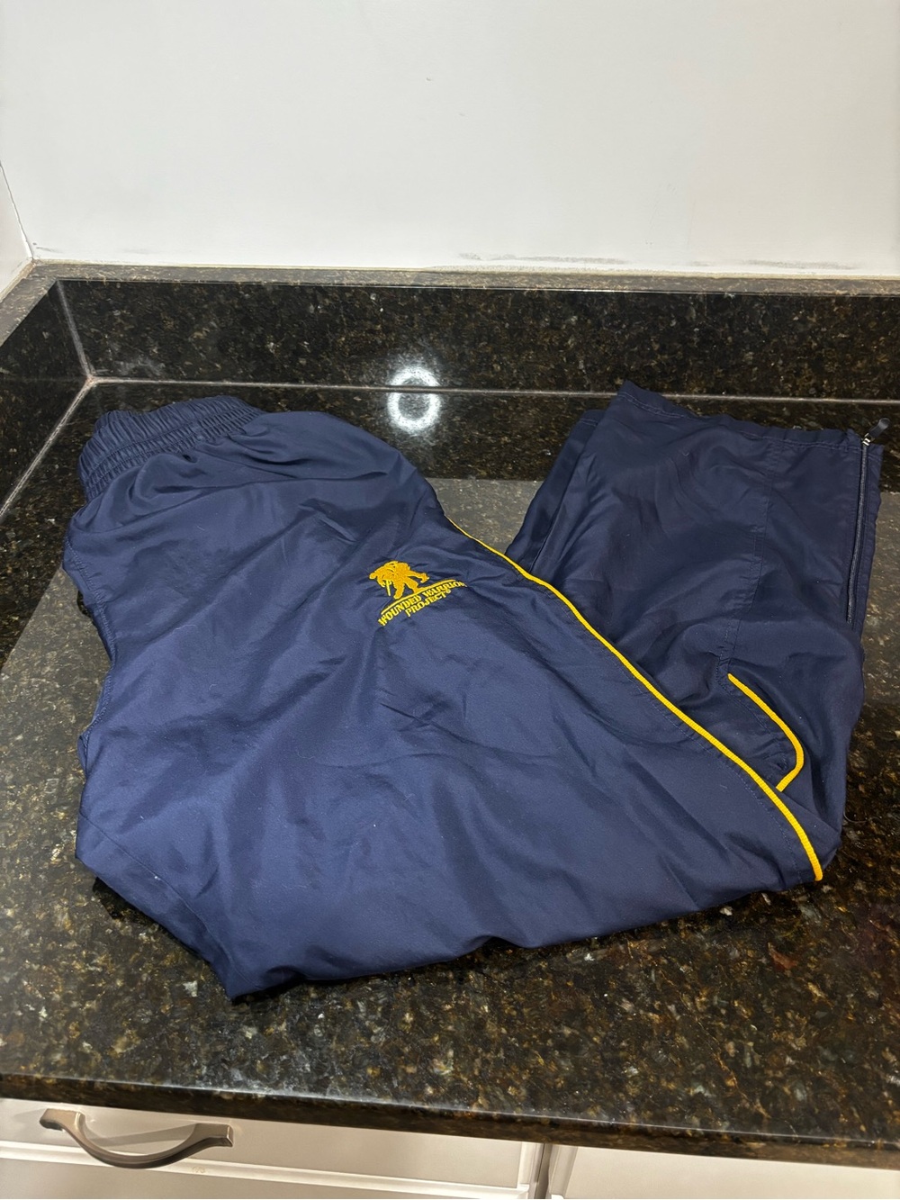 UNDER ARMOUR WOUNDED WARRIOR PROJECT Navy Blue Lined Track Pants W/Yellow Piping